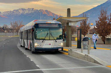 A bus stops at an outdoor bus station in Provo-Orem, Utah.